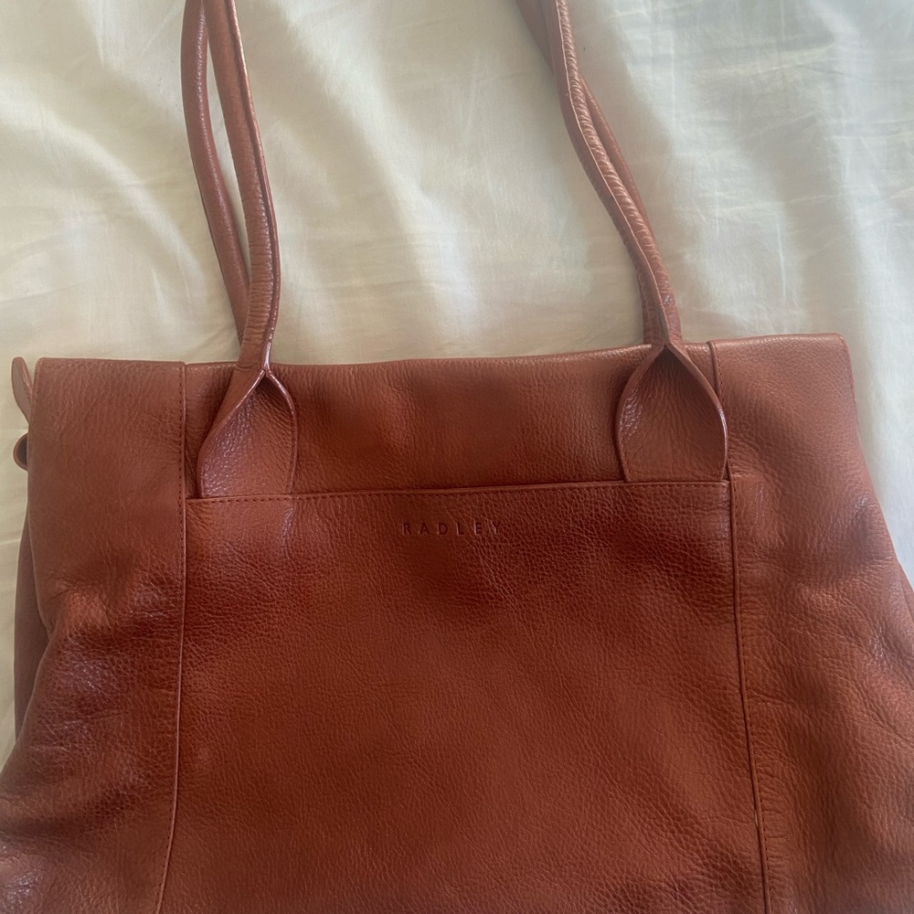Leather new condition  large inside, 6 pockets. Purchased in London